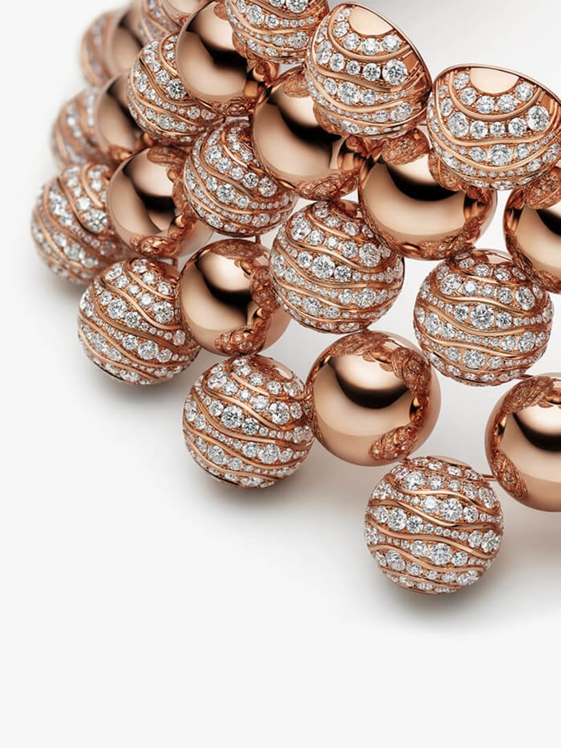 The Aurea Chandra High Jewellery necklace with hollow gold spheres.