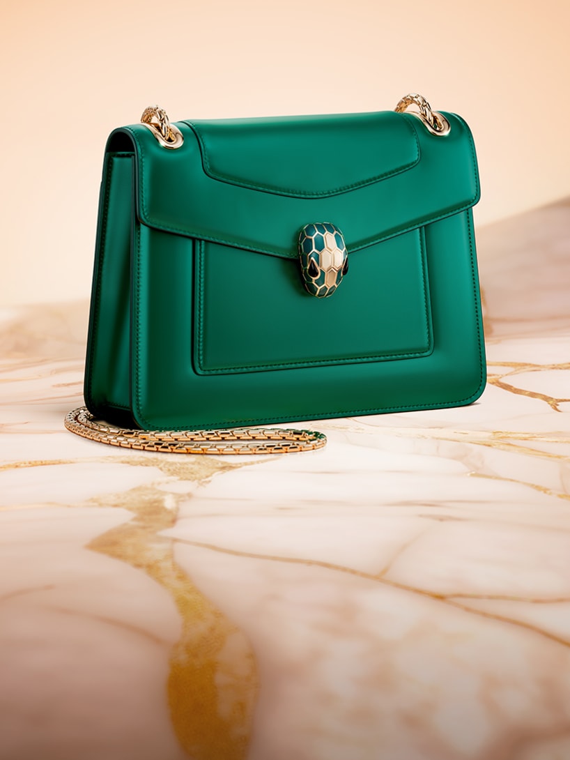 Serpenti Forever Day-to-Night small shoulder bag in emerald green calf leather with black nappa leather lining