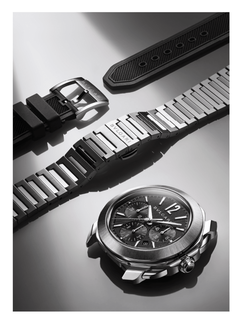 Octo Roma Chronograph watch in stainless steel with black dial, creative shot.