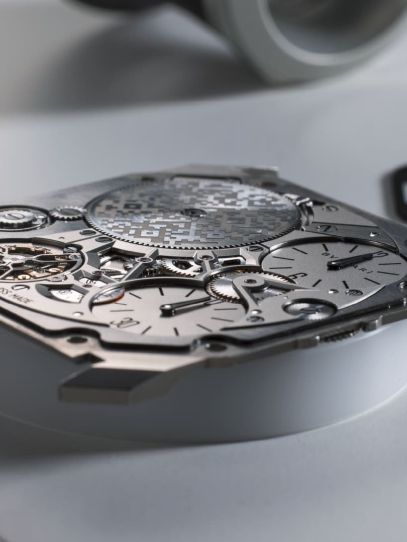 Creative shot with focus on extra-thin mechanical manufacture movement.