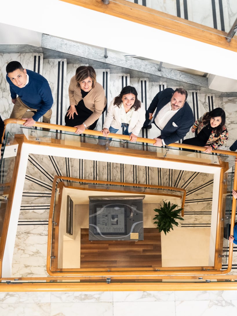 Bulgari employees standing on the stairs