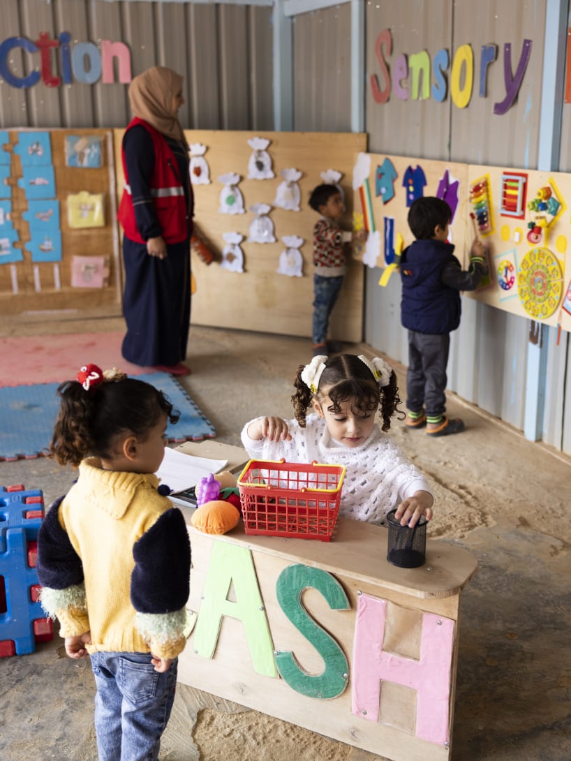 Children playing in a Bvlgari and Save the Children education centre.