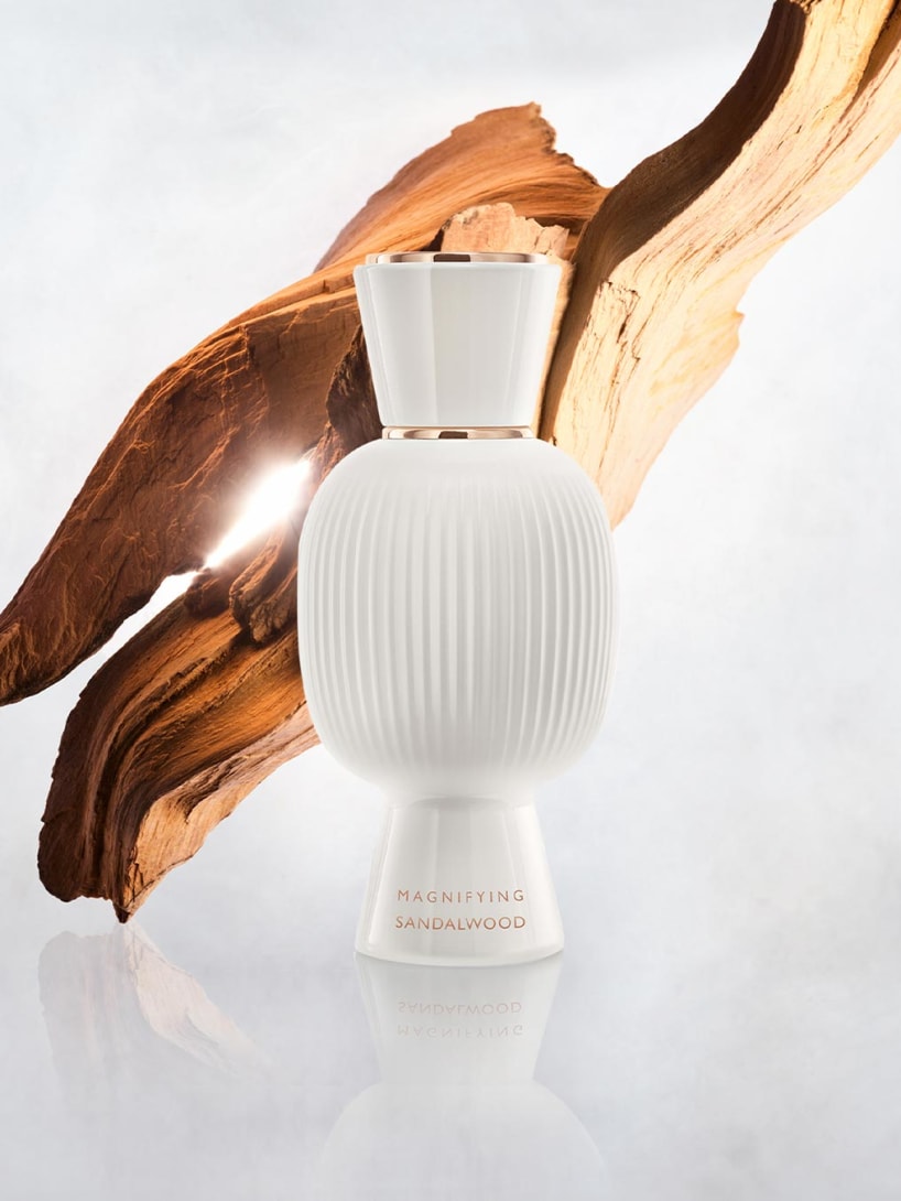 White flacon of the Bvlgari Allegra Magnifying Myrrh essence, creative shot.