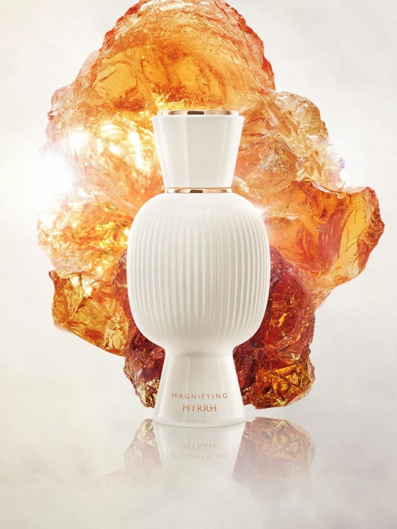 White flacon of the Bvlgari Allegra Magnifying Myrrh essence, creative shot.