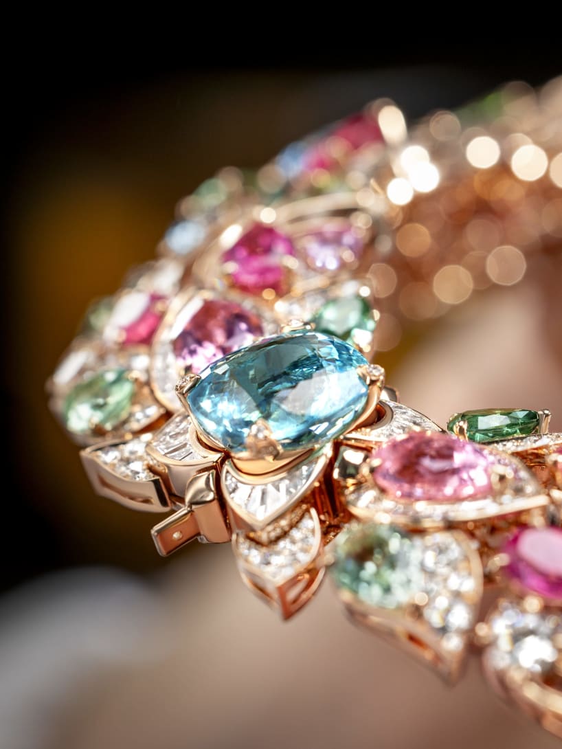 Hand holding Celestial Mosaic Necklace, Polychroma High Jewellery collection.