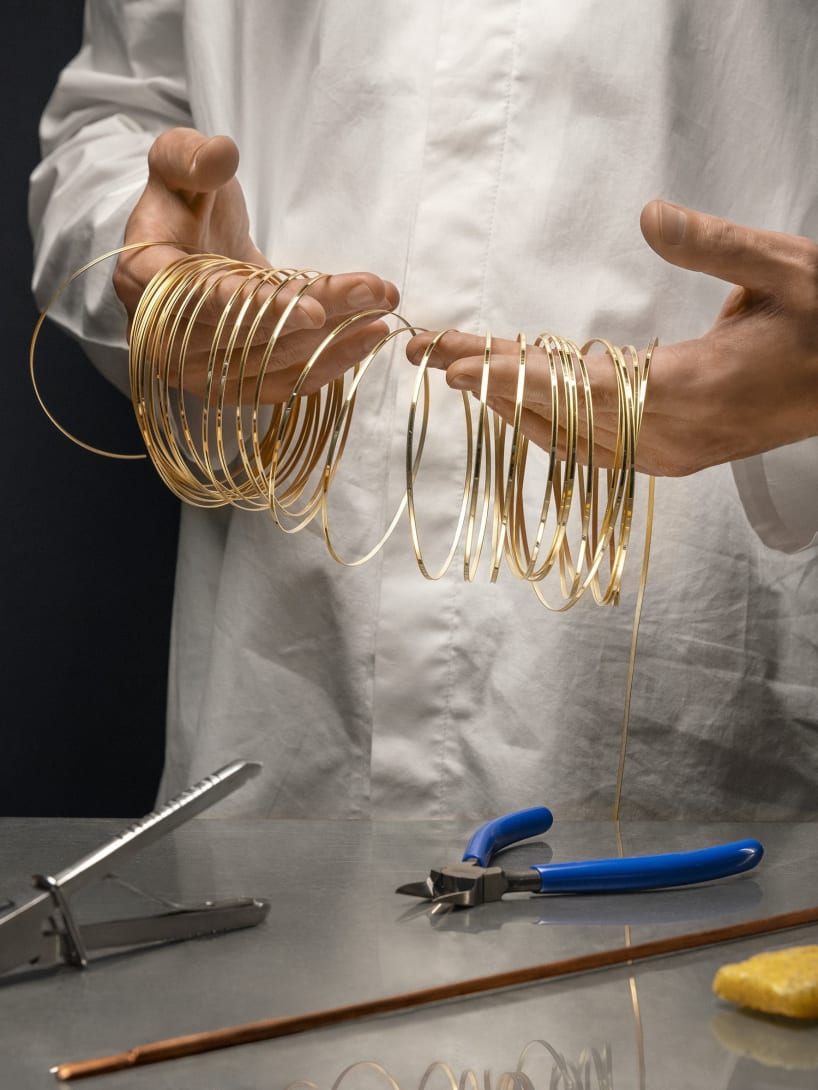 Man working on Tanzanite Falls Necklace, Polychroma High Jewellery collection.
