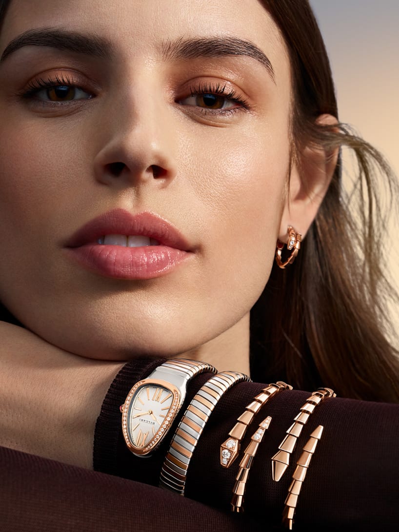 Model wearing Serpenti jewellery and watch, magnificent icons campaign.