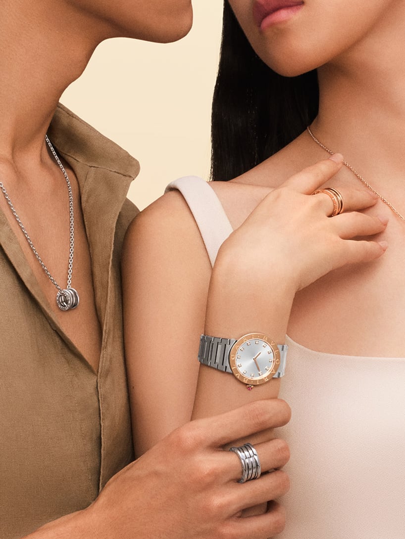 Picture representing a couple wearing Bzero1 jewels and Bvlgari Bvlgari watch.