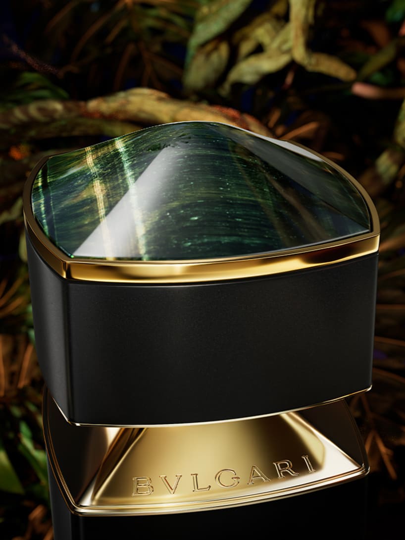 Dark green cap of the Bvlgari Le Gemme Falkar fragrance inspired by the Falcon's Eye stone, close up.