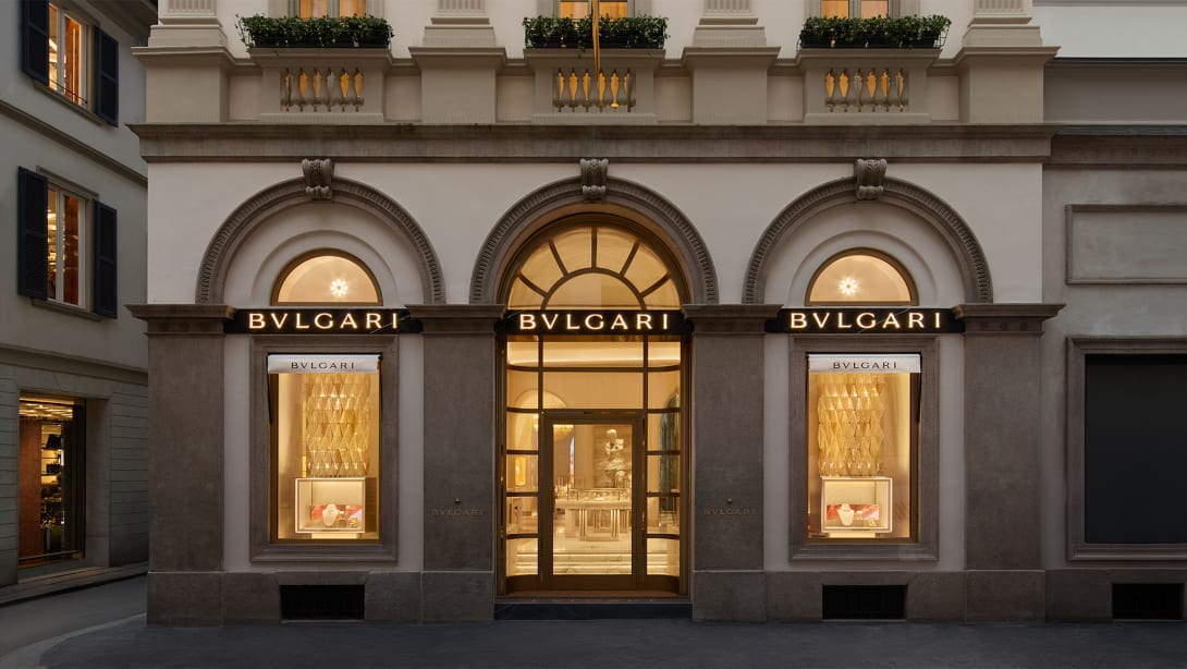 Facade of the Roman Bulgari store in via Condotti with central portal, side windows and Bulgari inscription. 
