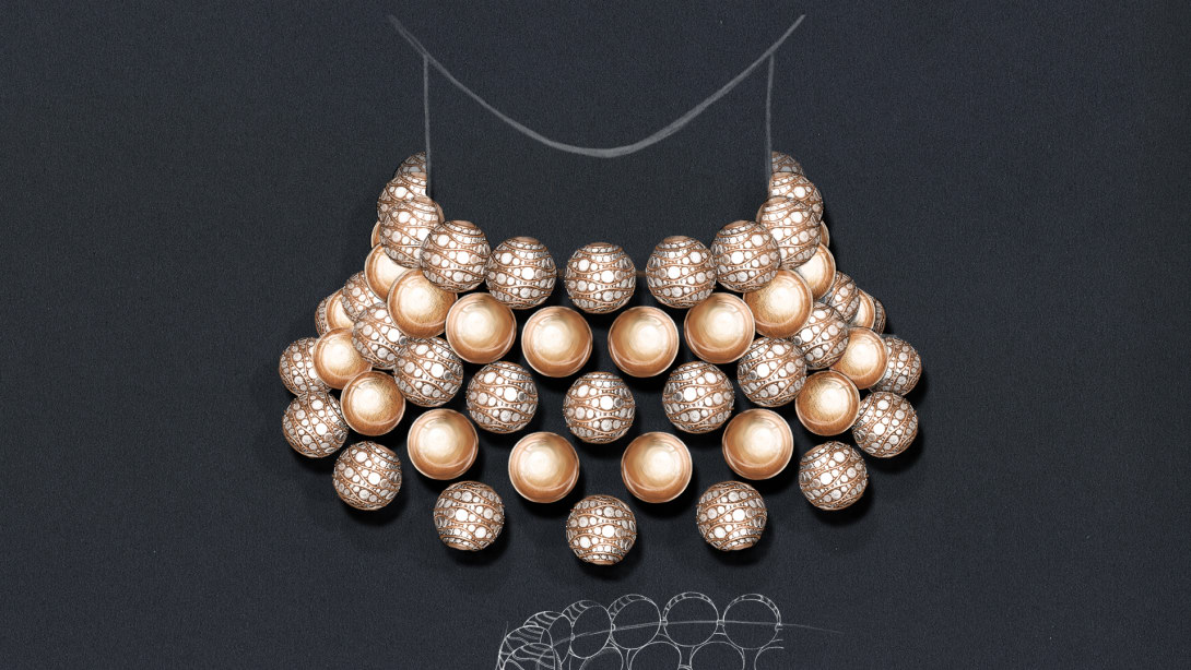 Aurea Chandra High Jewellery necklace with hollow gold sphere, close-up.