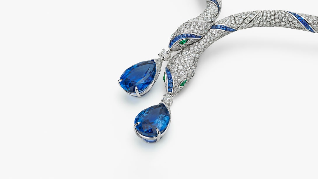 The Serpenti Sapphire Echo High Jewellery necklace with sapphires, diamonds and emeralds, full view.