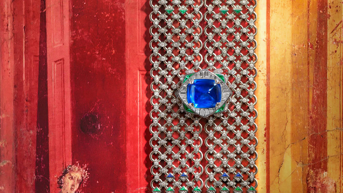 Seres Scarf High Jewellery white gold necklace set with a cushion sapphire, emeralds, sapphires and diamonds.