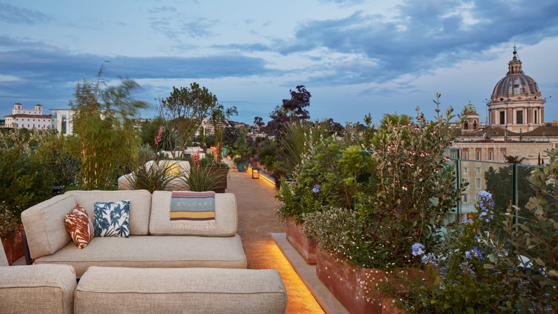 A rooftop terrace featuring lush vegetation, La Terrazza