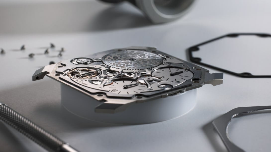 Creative shot with focus on extra-thin mechanical manufacture movement.