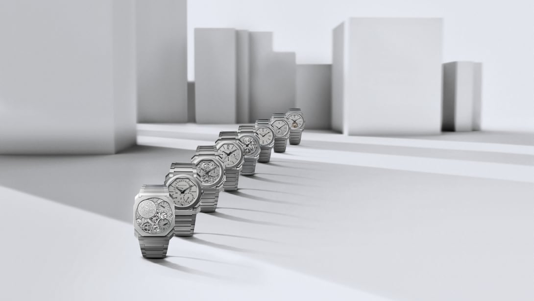Octo Finissimo world records watches with different calibers and materials, white abstract backdrop.