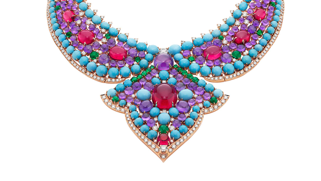 The Bvlgari Lotus Cabochon High Jewellery necklace with rubellite, emerald, turquoise and amethyst cabochon, close-up.