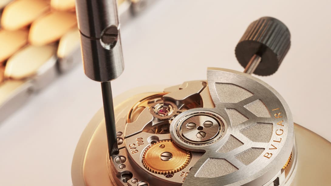 Close up on the assembly of a Serpenti watch