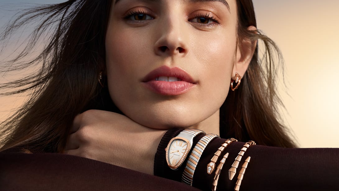 Model wearing Serpenti jewellery and watch, magnificent icons campaign.
