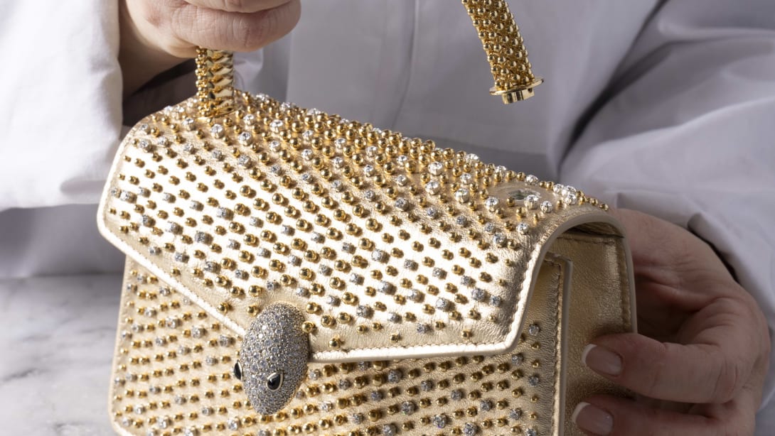 Bvlgari artisans working on Serpenti bag.