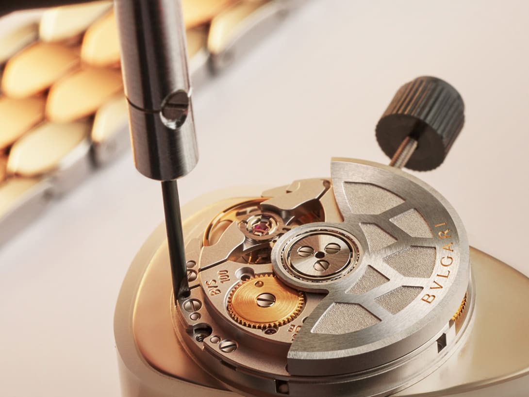 Close up on the assembly of a Serpenti watch
