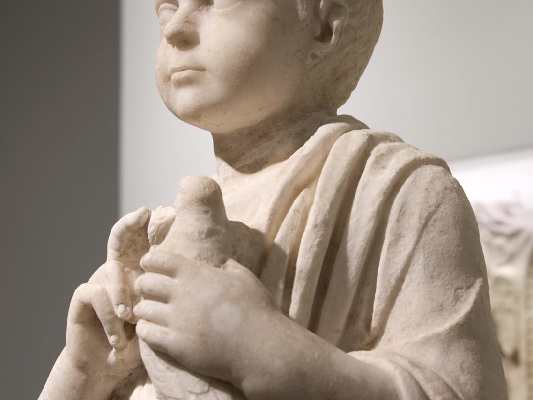 Bust of a young boy, part of the Torlonia Collection, on display at the Myth and Marble exhibition.