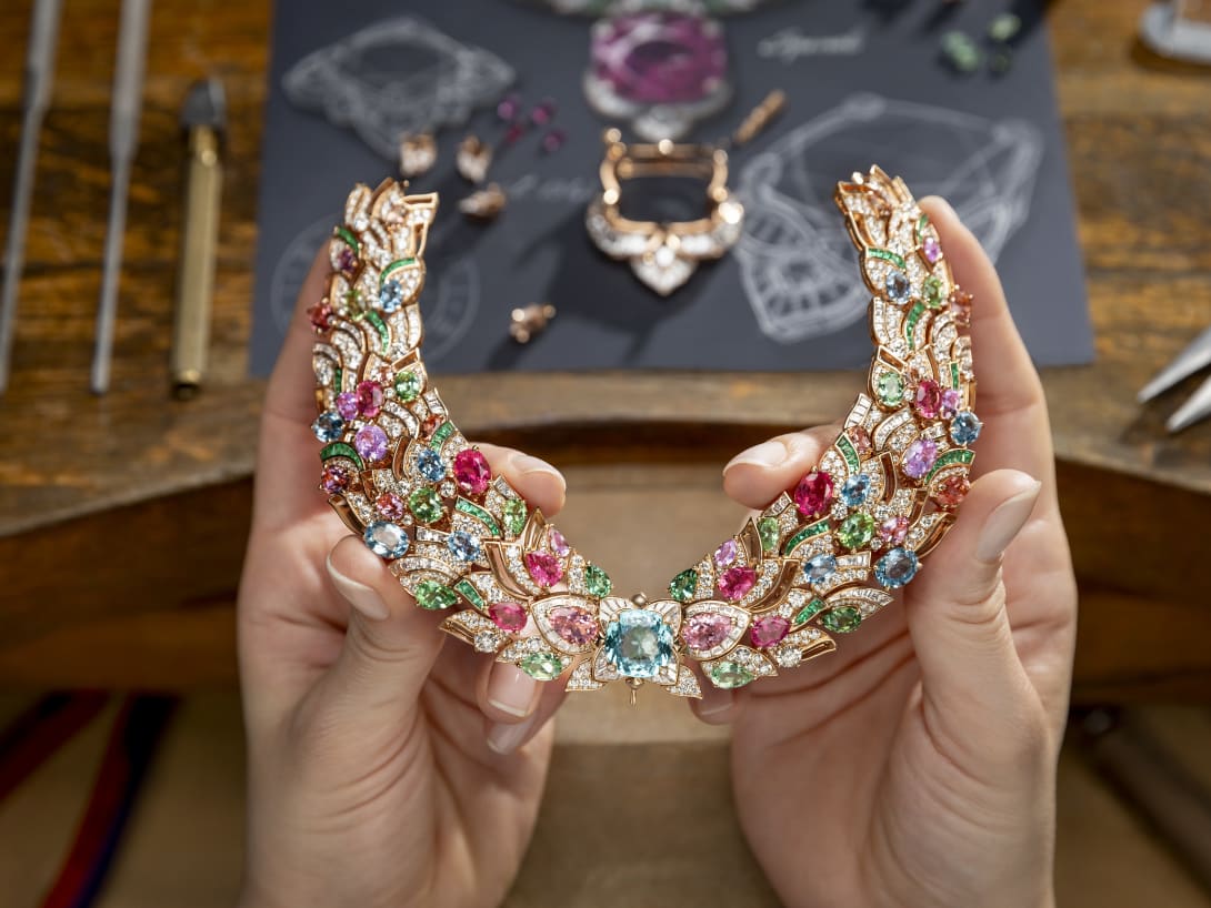 Hand holding Celestial Mosaic Necklace, Polychroma High Jewellery collection.
