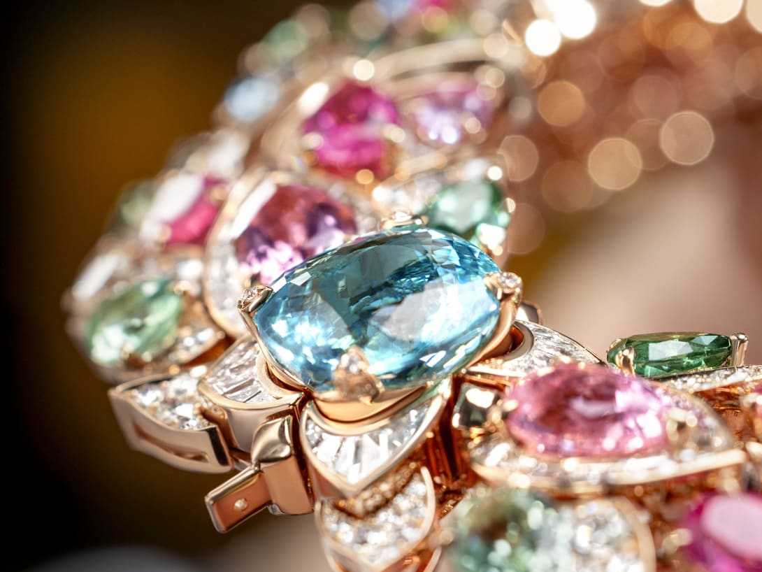 Hand holding Celestial Mosaic Necklace, Polychroma High Jewellery collection.