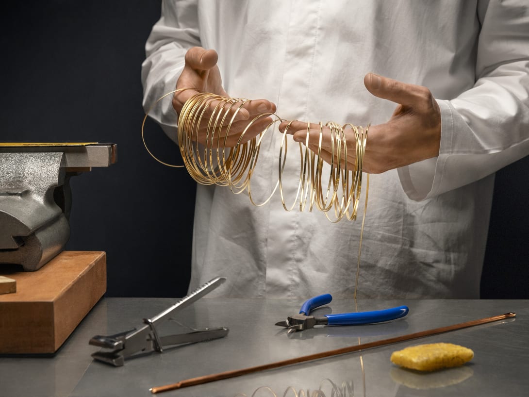 Man working on Tanzanite Falls Necklace, Polychroma High Jewellery collection.