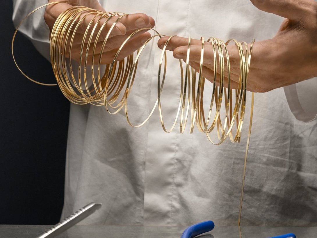 Man working on Tanzanite Falls Necklace, Polychroma High Jewellery collection.