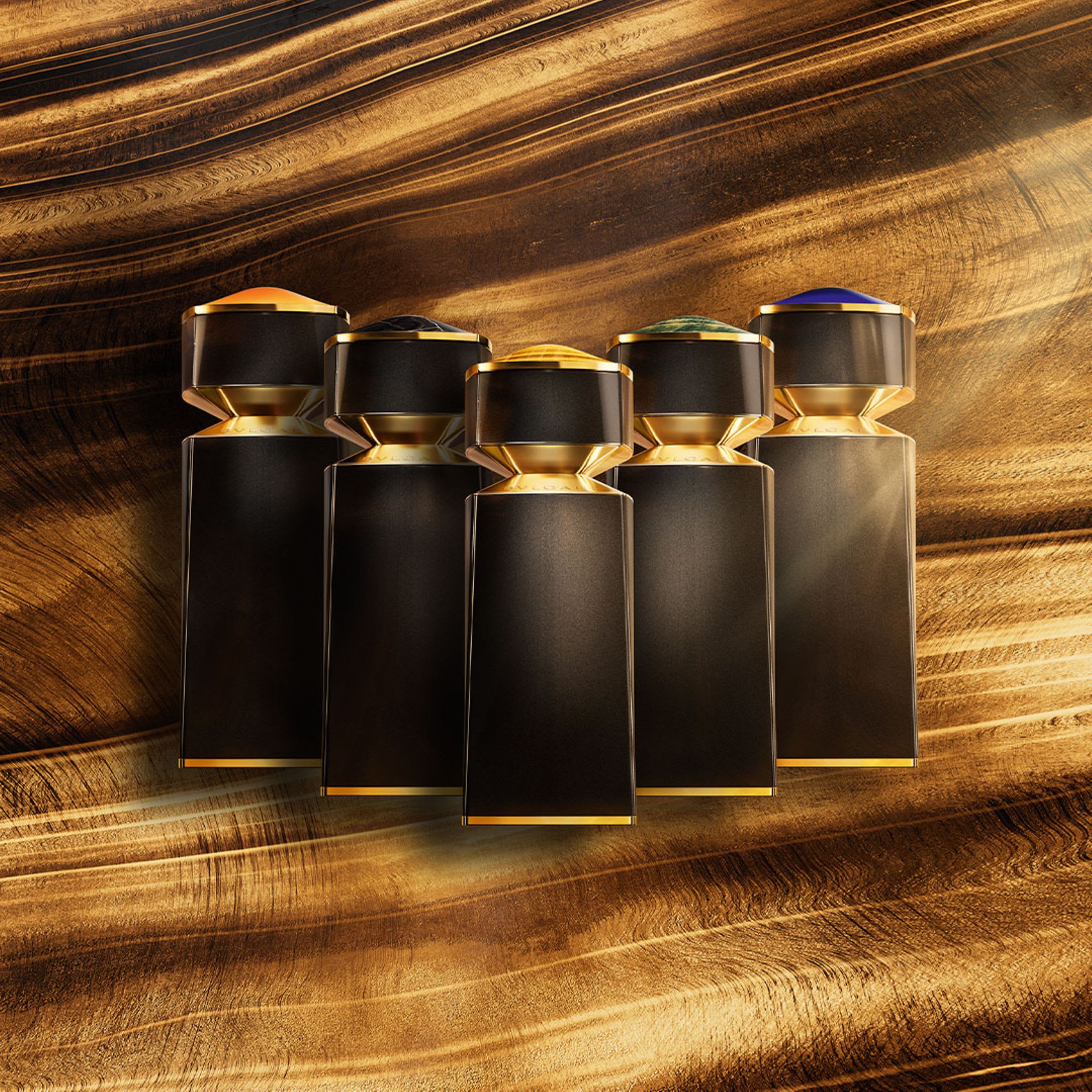 Five Eau de Parfum of the Bvlgari Le Gemme fragrance collection, brown creative backdrop.