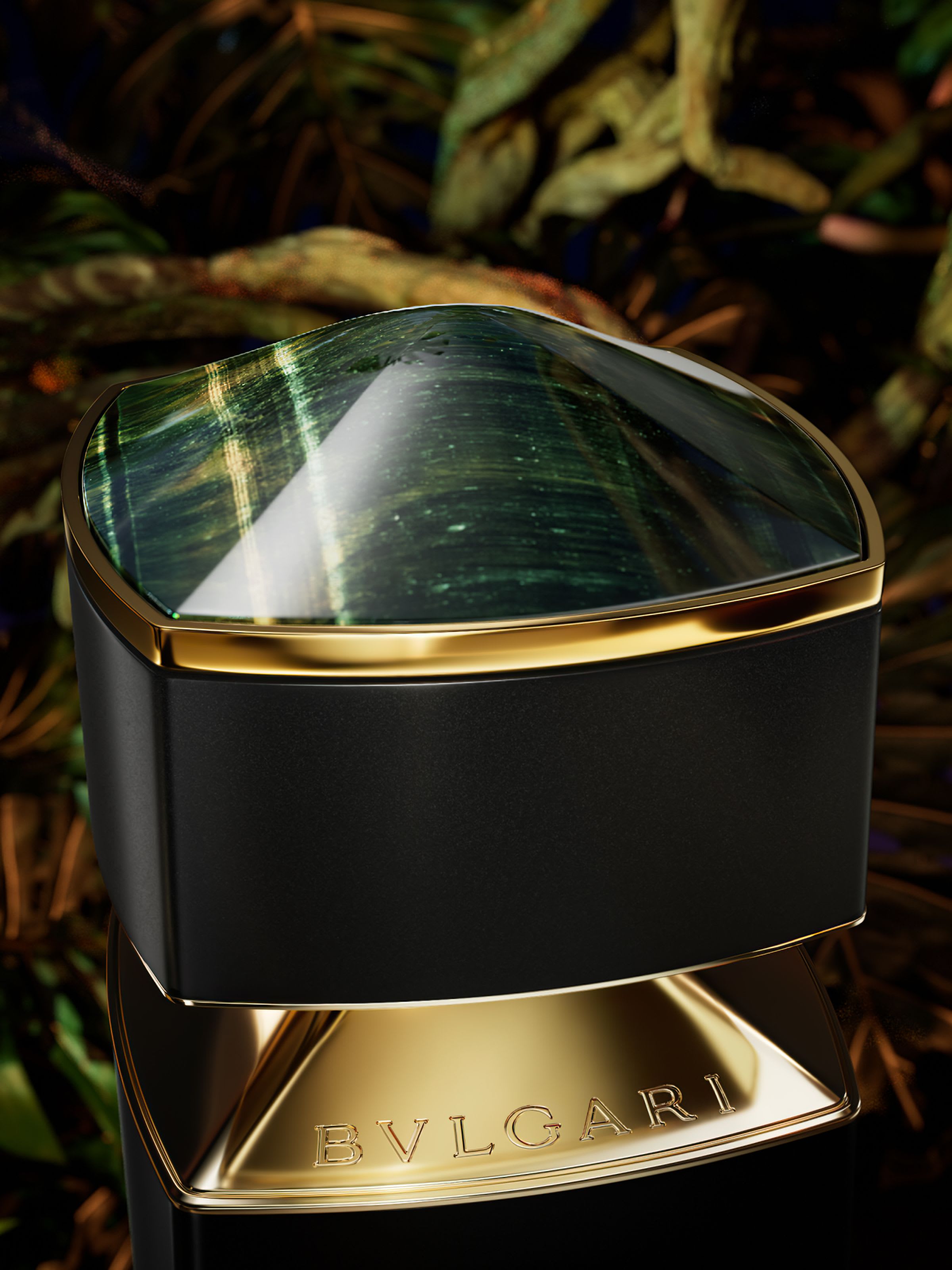 Dark green cap of the Bvlgari Le Gemme Falkar fragrance inspired by the Falcon's Eye stone, close up.