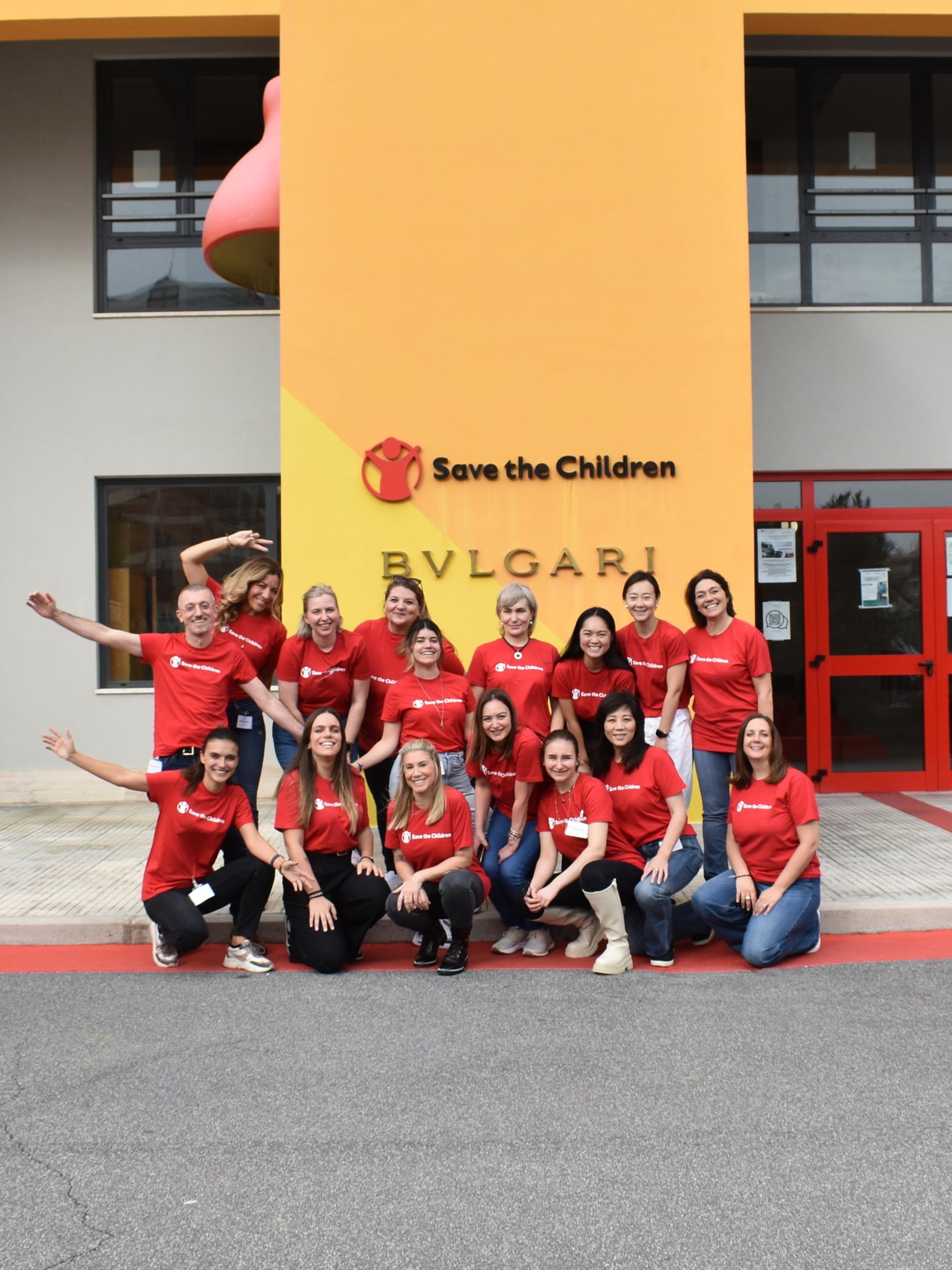 Bulgari and Save The Children employees posing together