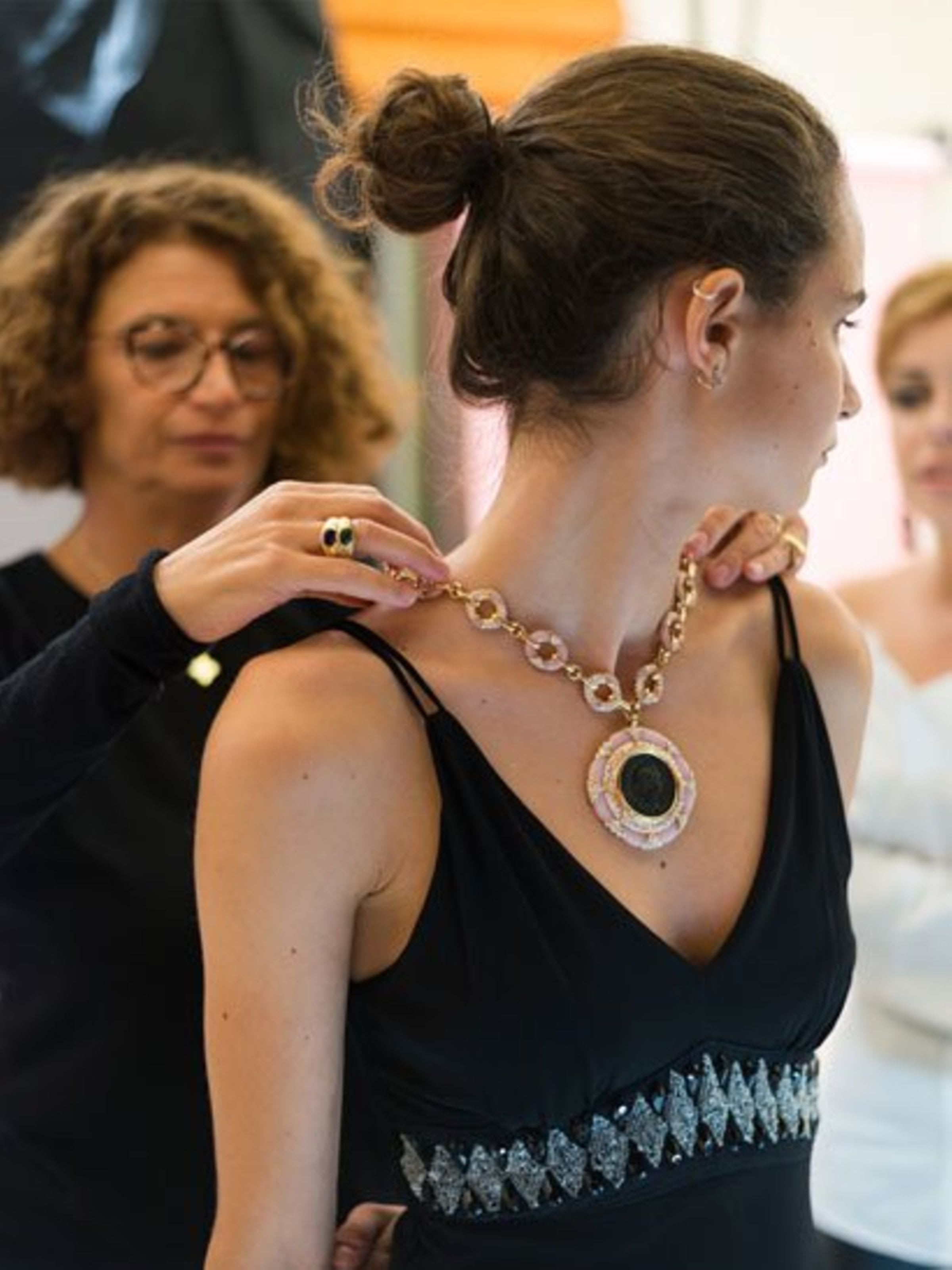 Image representing a model wearing Bvlgari necklace.