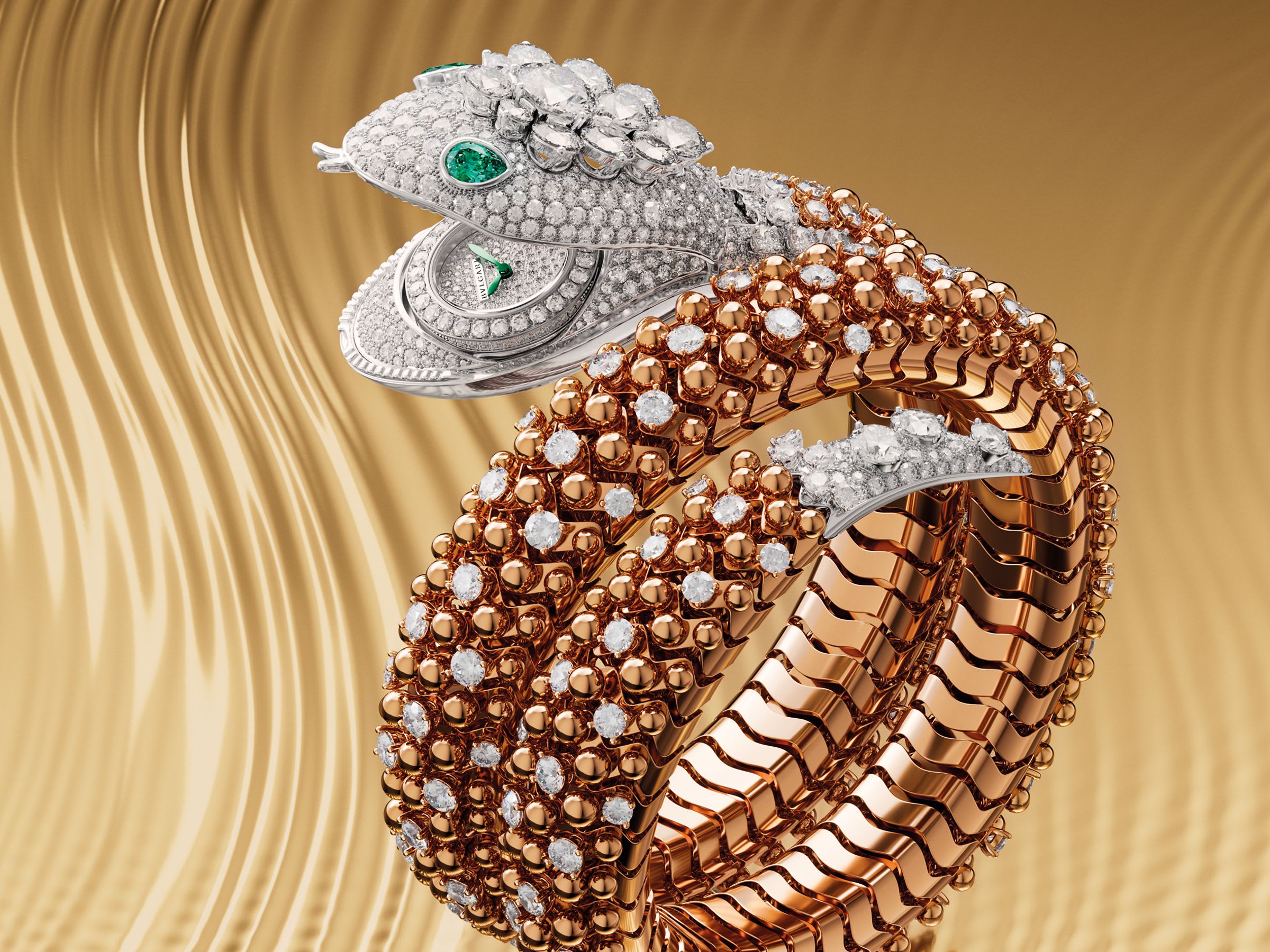 Serpenti Pallini High Jewellery secret watch in rose and white gold with diamonds, creative shot.