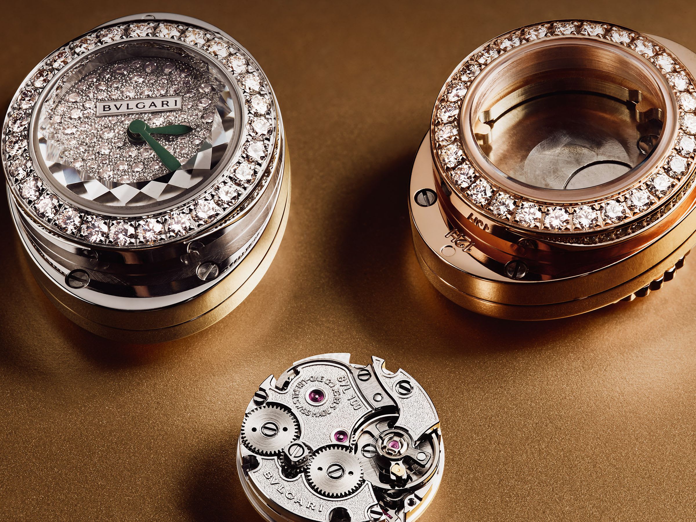 Diamond-set white and rose gold case and calibre of the Serpenti Pallini watch, gold background.