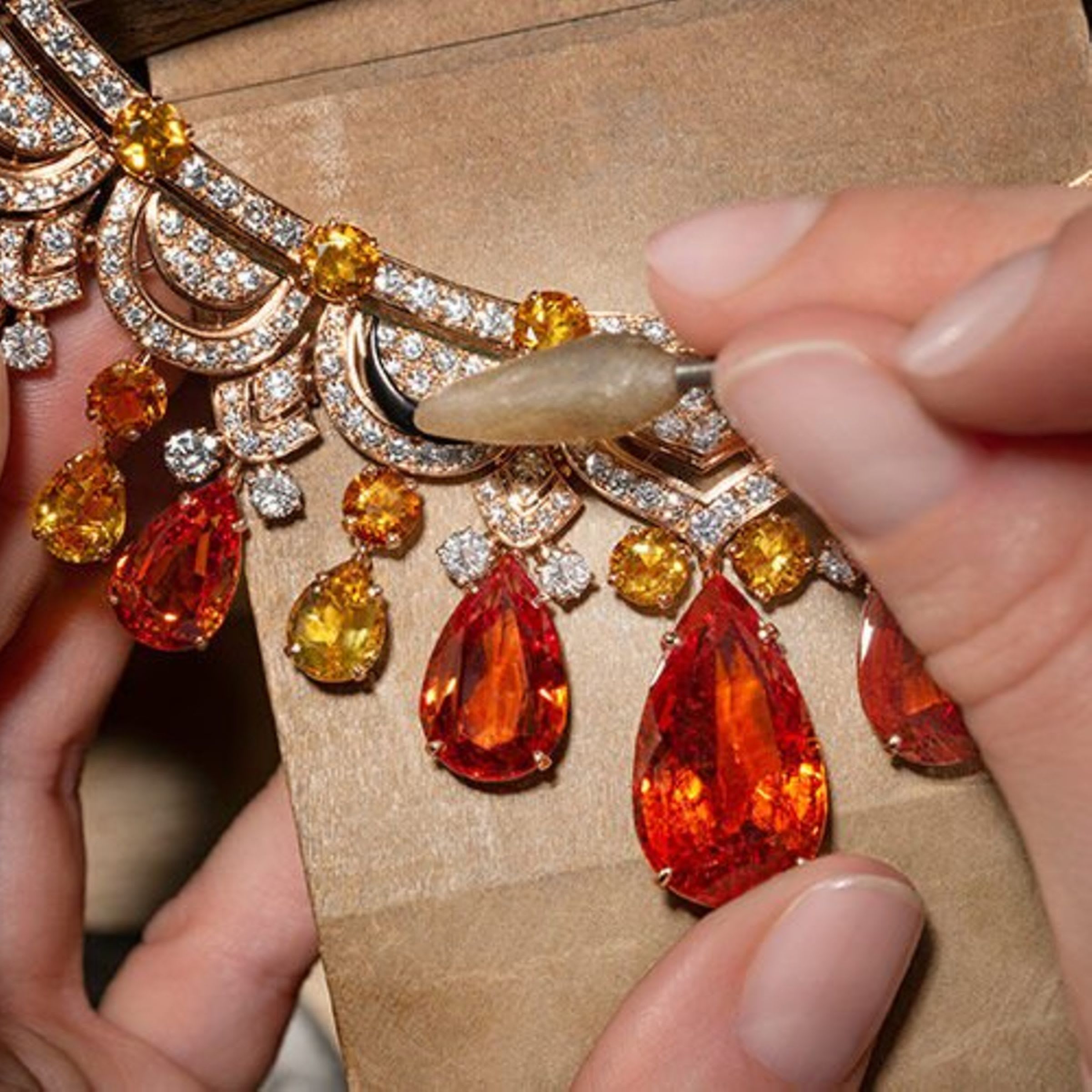 Bvlgari craftsman creating high jewelery necklace.