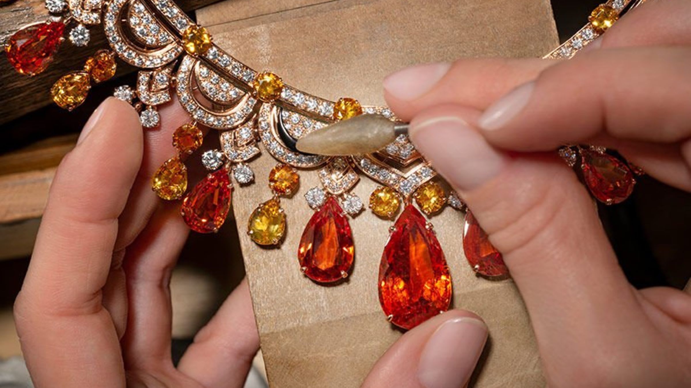Bvlgari craftsman creating high jewelery necklace.