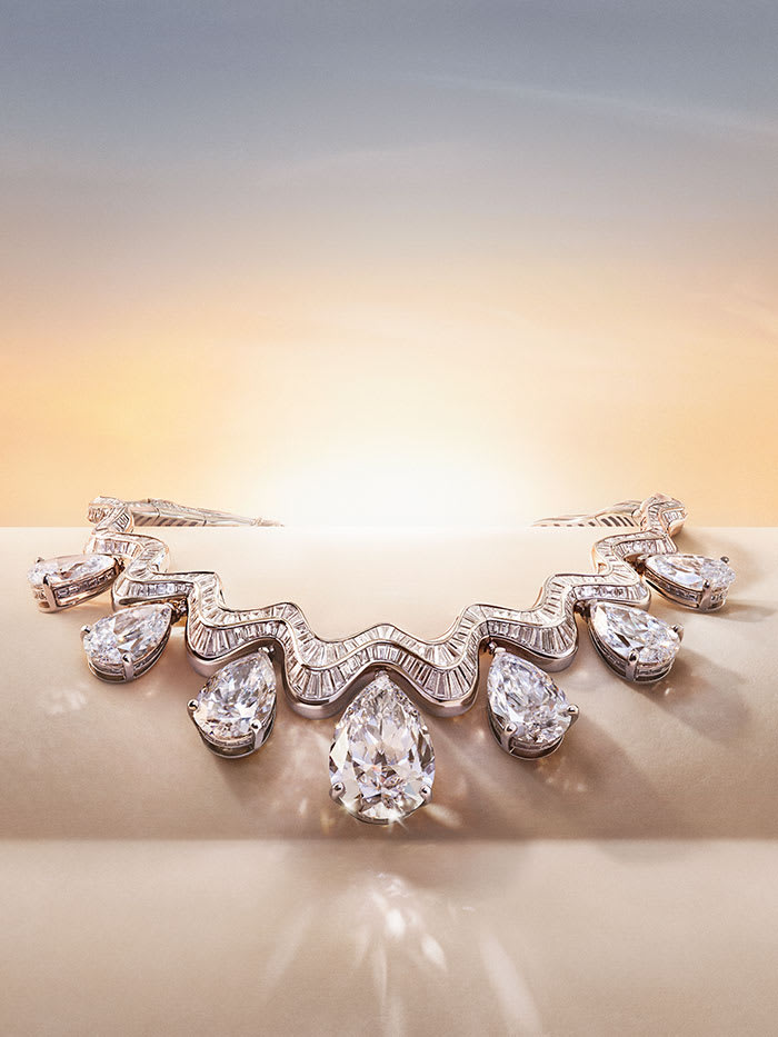 Aeterna High Jewellery necklace with seven flawless diamonds, infinite horizon with sunrise.